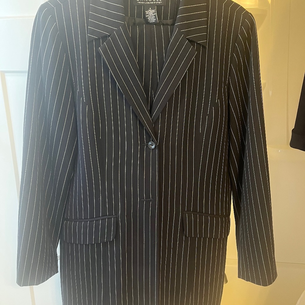 Black suit with white pinstripe